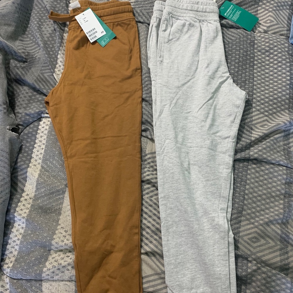 Two pairs of kid boys sweat pants